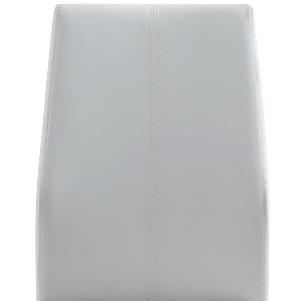 Set of Four White and Silver Upholstered Faux Leather Dining Side Chairs