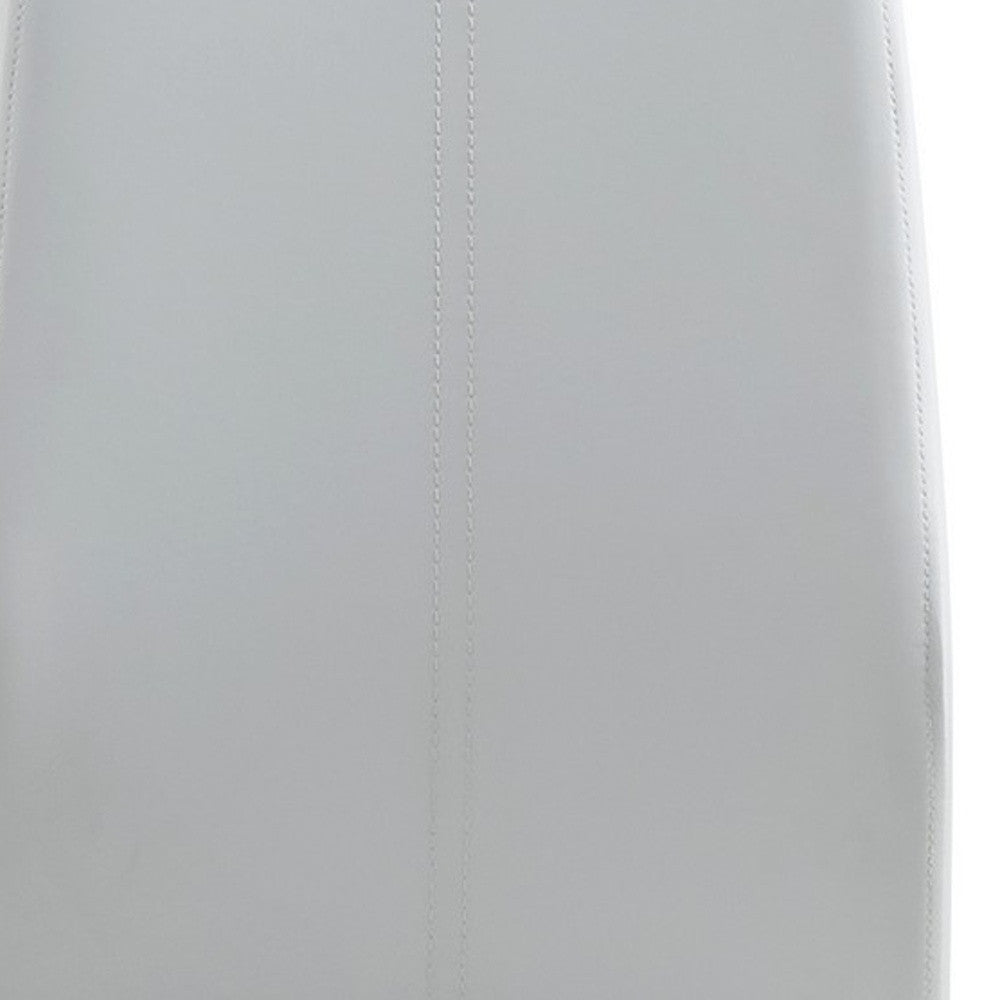 Set of Four White and Silver Upholstered Faux Leather Dining Side Chairs