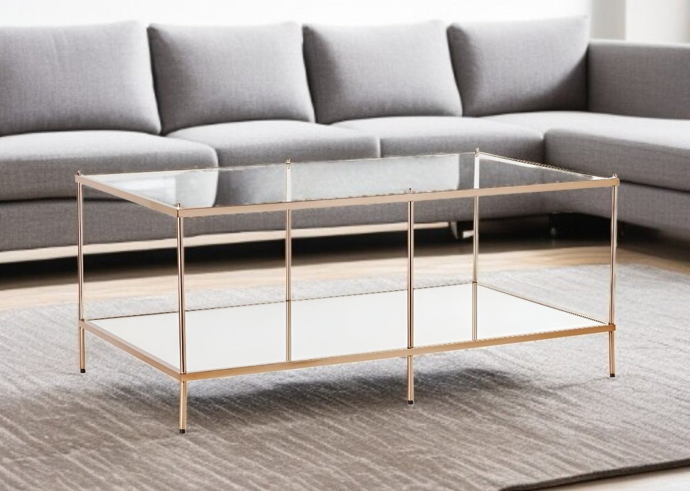 42" Clear And Gold Glass And Metal Coffee Table