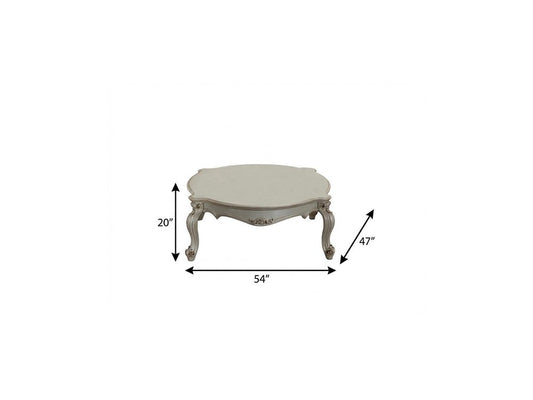 54" Pearl Wood And Polyresin Coffee Table