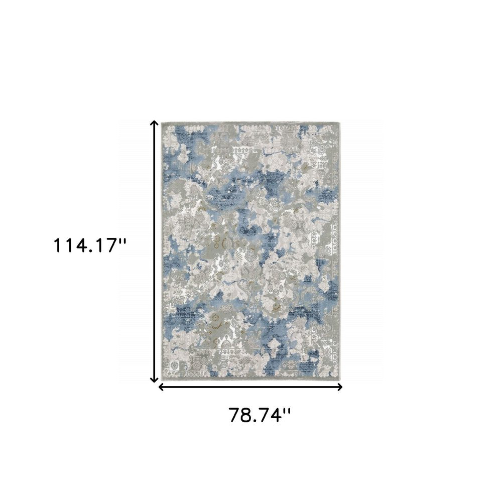 5' X 8' Grey Blue Ivory Navy Beige And Brown Abstract Power Loom Stain Resistant Area Rug