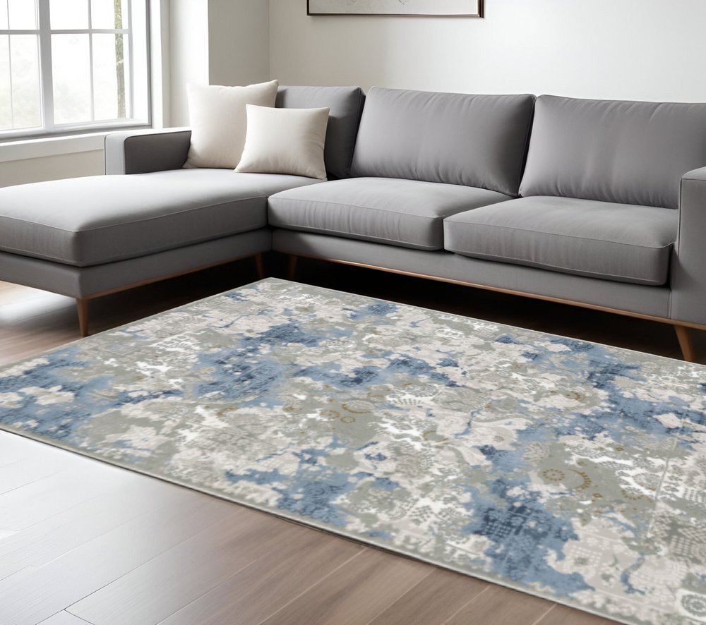5' X 8' Grey Blue Ivory Navy Beige And Brown Abstract Power Loom Stain Resistant Area Rug
