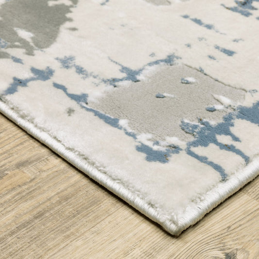 8' X 11' Grey Blue Brown Ivory And Deep Blue Abstract Power Loom Stain Resistant Area Rug
