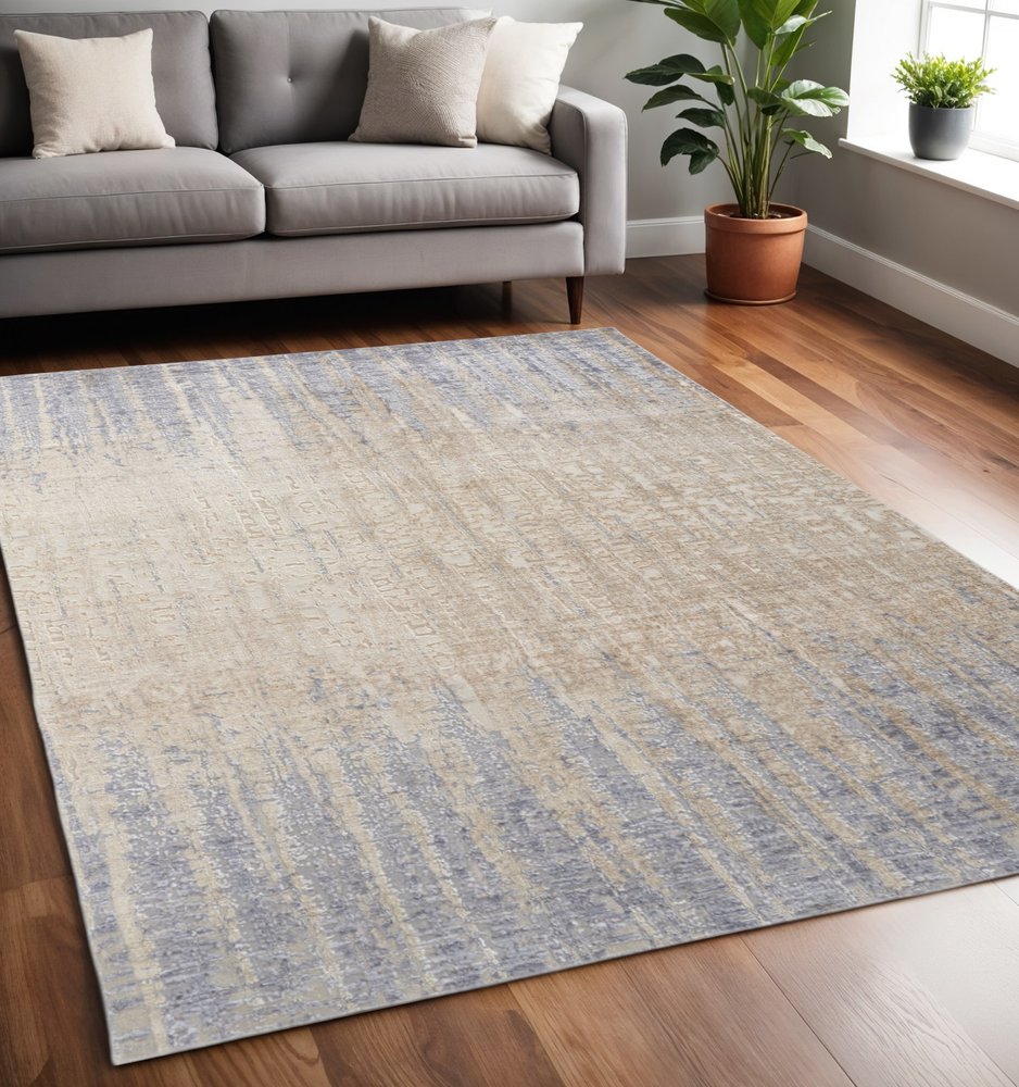4' X 6' Tan And Blue Abstract Distressed Area Rug
