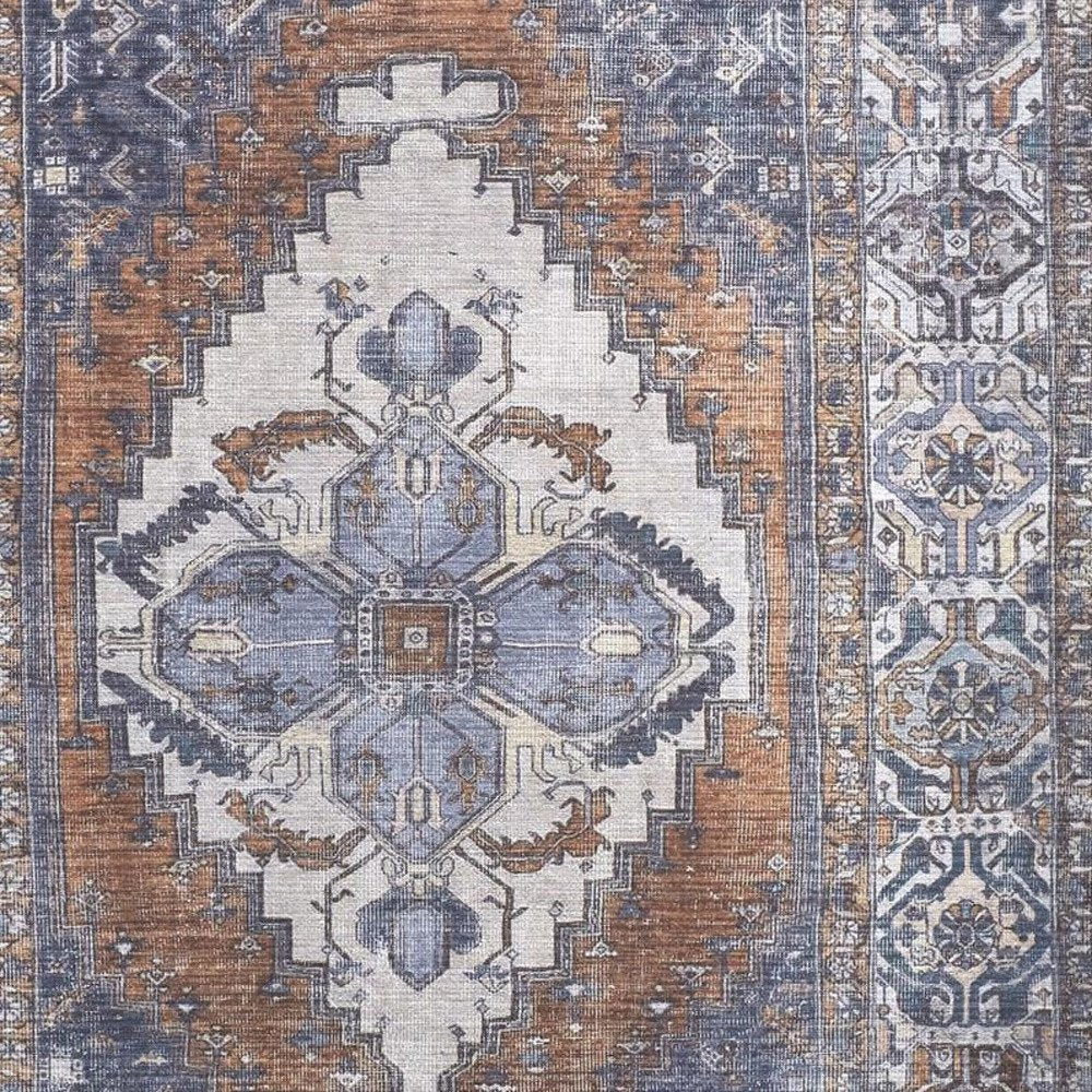 9' X 12' Blue And Ivory Floral Medallion Area Rug