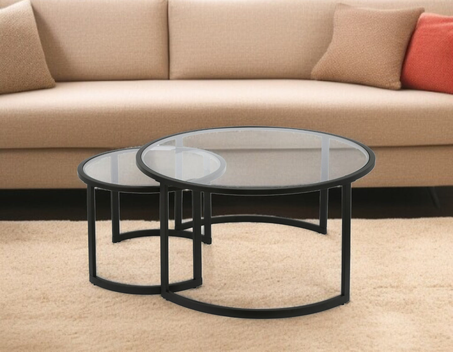 Set of Two Black Glass And Steel Round Sled Nested Coffee Tables
