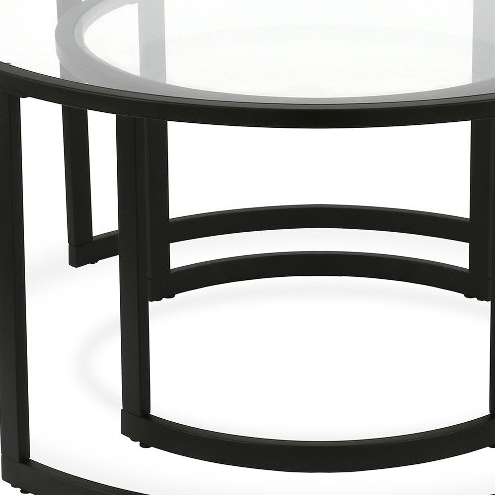 Set of Two Black Glass And Steel Round Sled Nested Coffee Tables