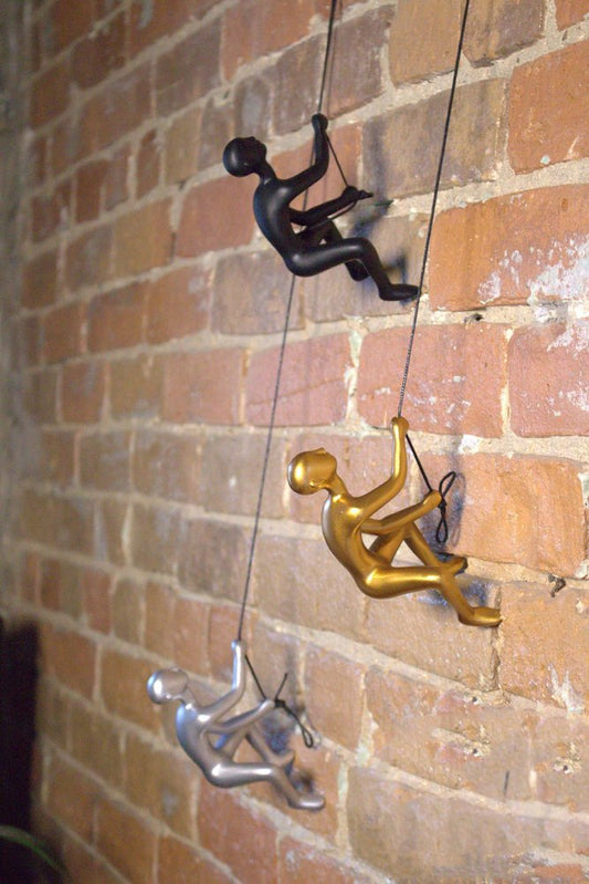 Set of Two Gold Resin Climbing Man Hanging Dimensional Sculpture
