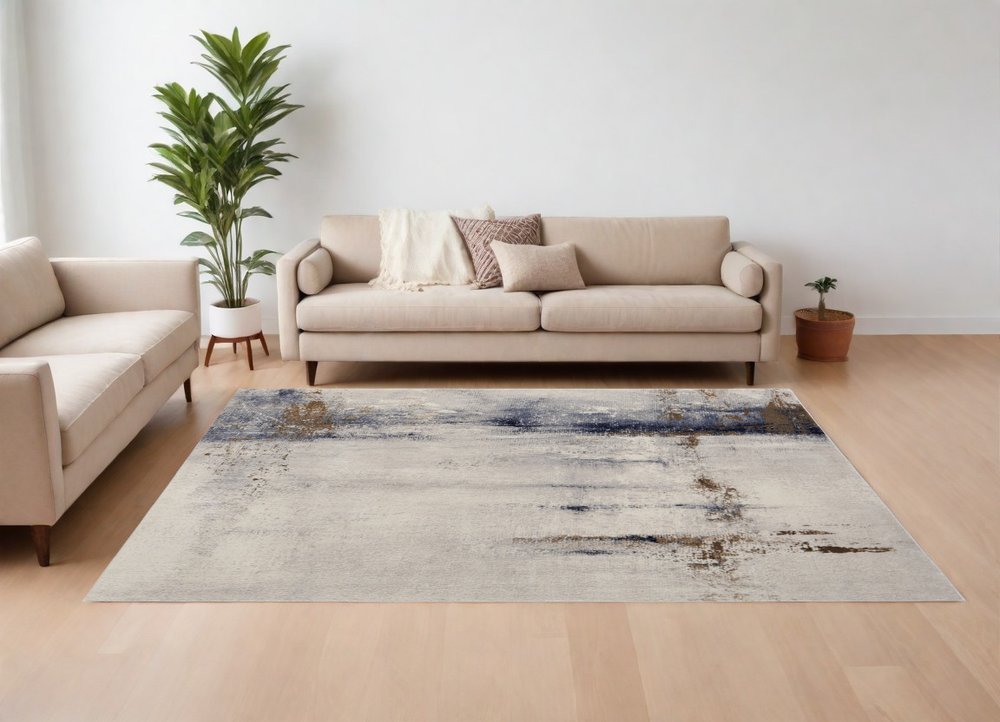 5' X 8' Ivory Blue and Brown Abstract Power Loom Area Rug
