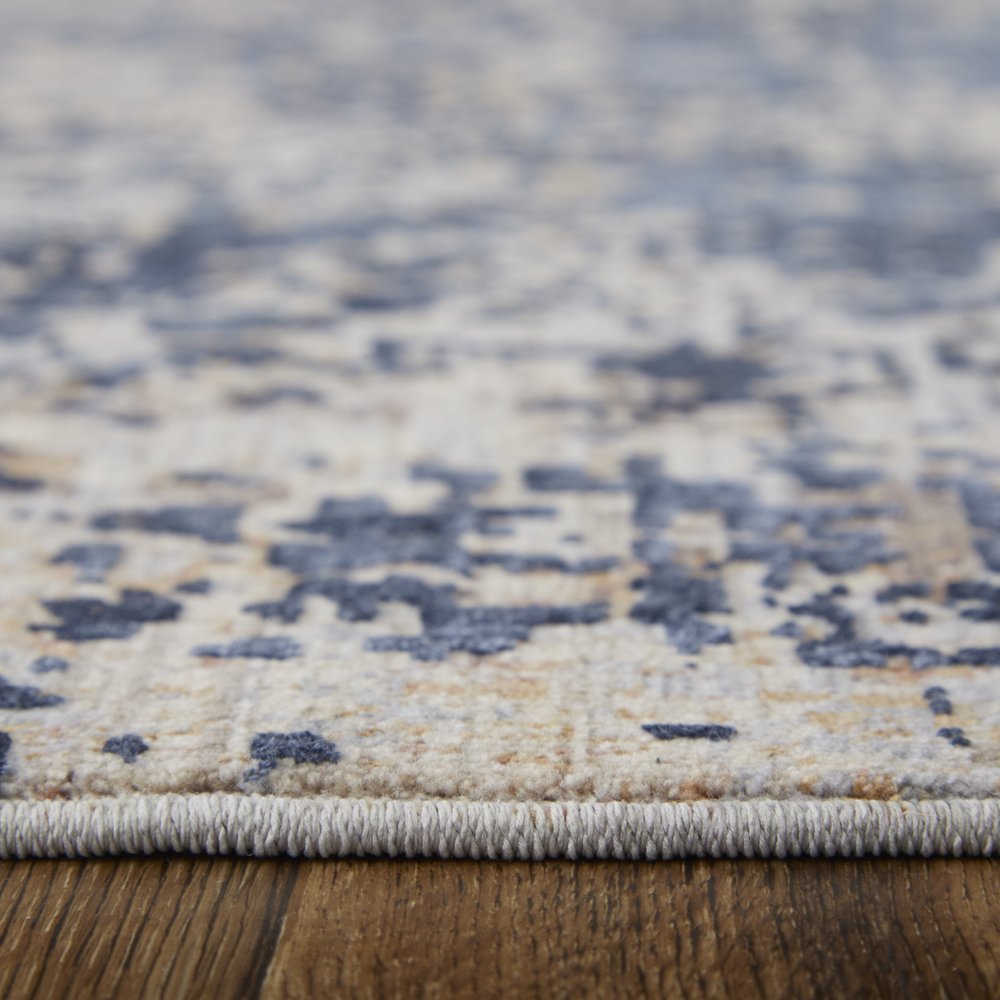 5' X 8' Blue Brown and Tan Abstract Power Loom Area Rug