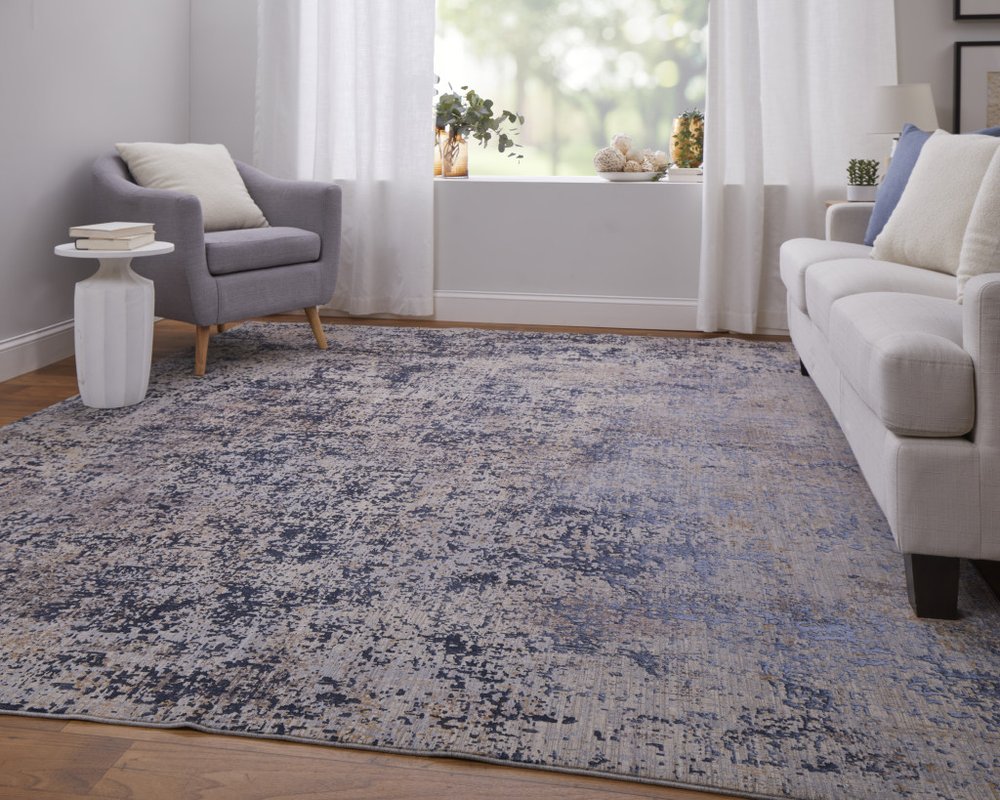 5' X 8' Blue Brown and Tan Abstract Power Loom Area Rug