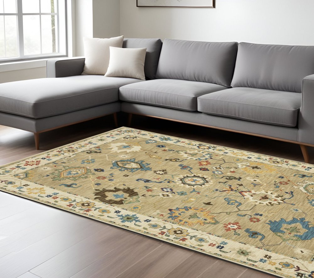 8' X 11' Beige Light Blue And Tan Oriental Area Rug With Fringe