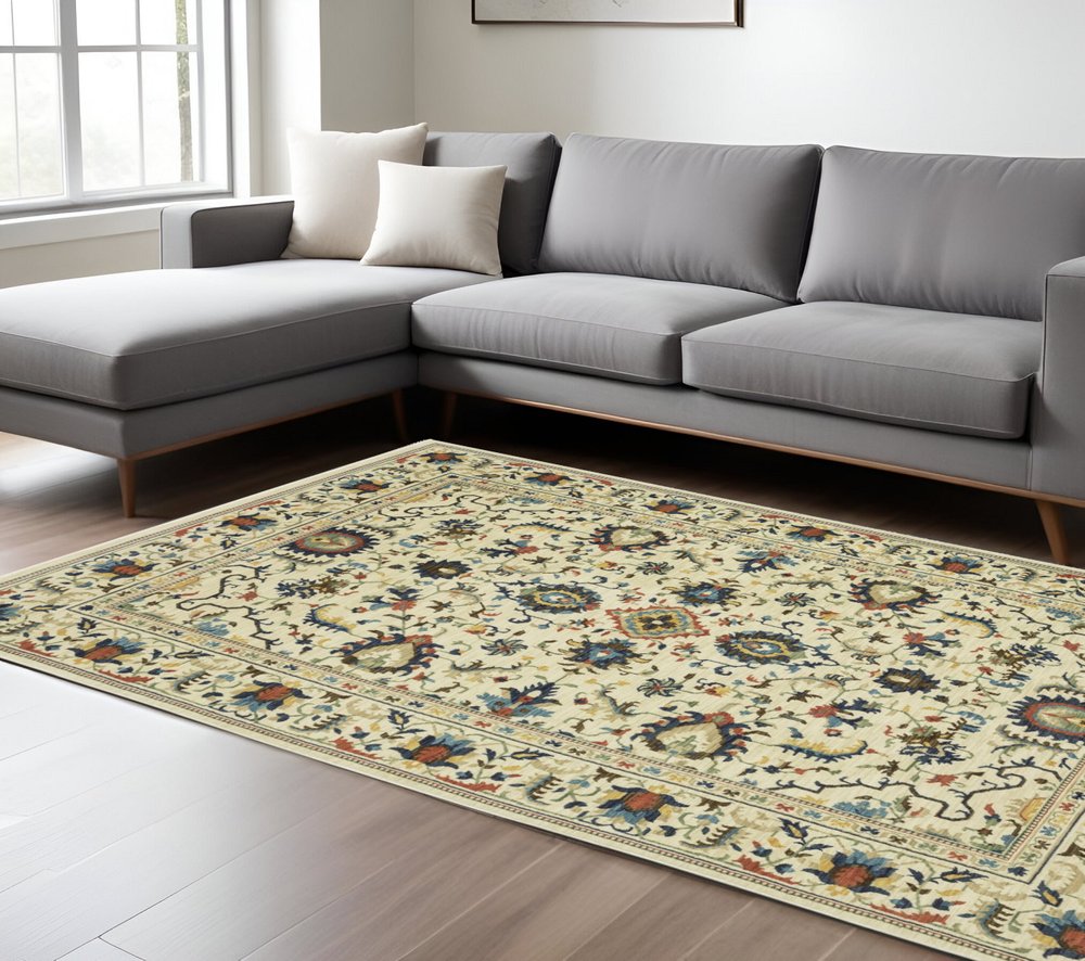 8' X 11' Ivory Blue And Orange Oriental Area Rug With Fringe