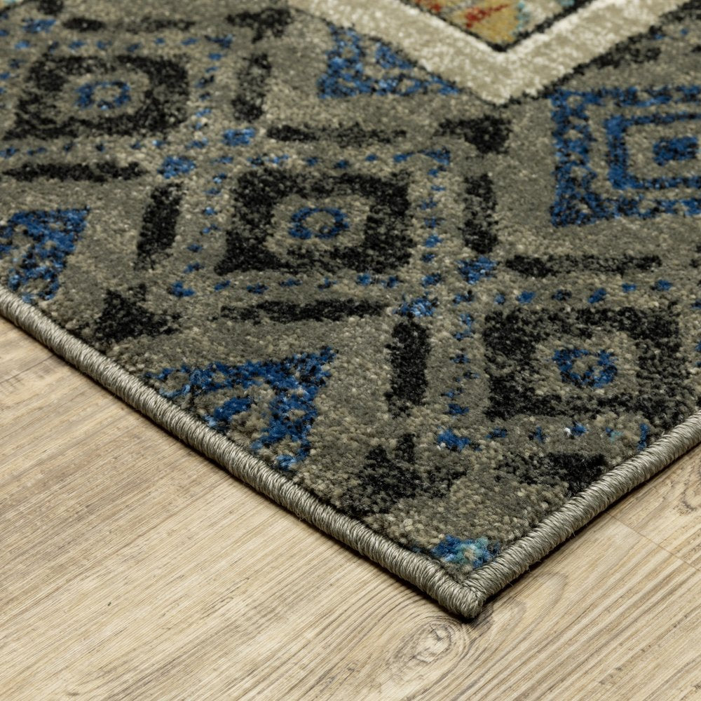 8' X 10' Brown Tan And Blue Patchwork Area Rug