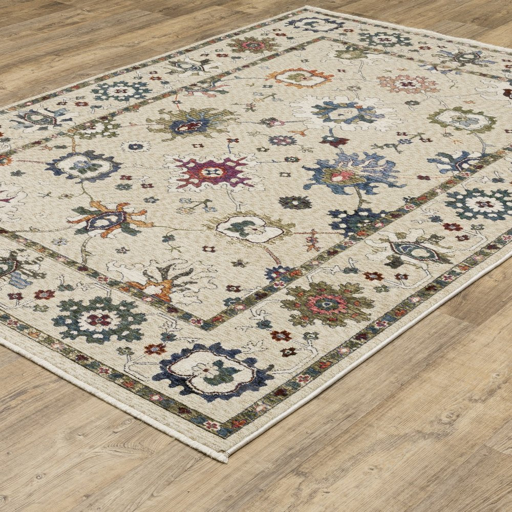 8' X 11' Ivory Blue And Light Brown Floral Area Rug With Fringe