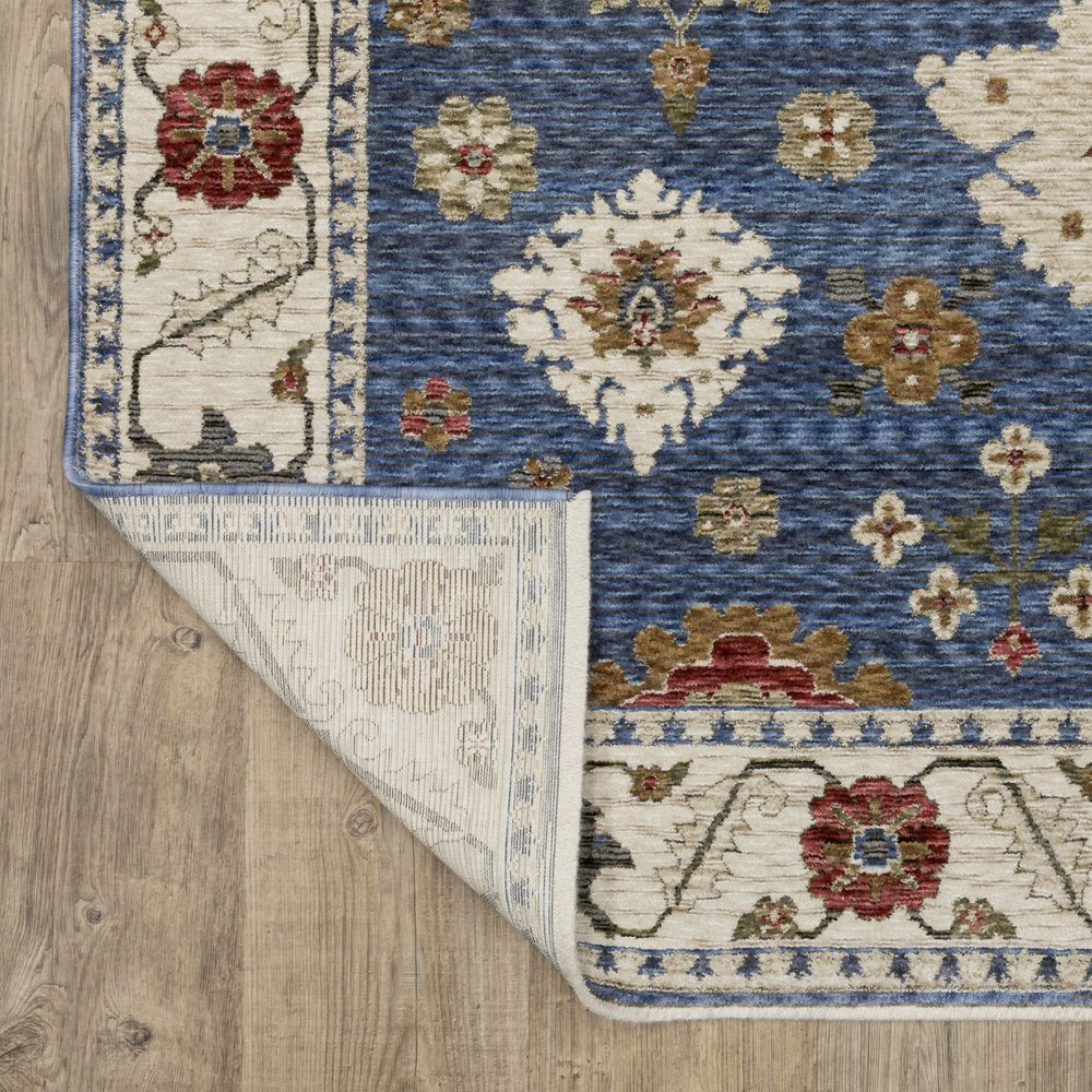 8' X 11' Blue And Ivory Floral Area Rug With Fringe