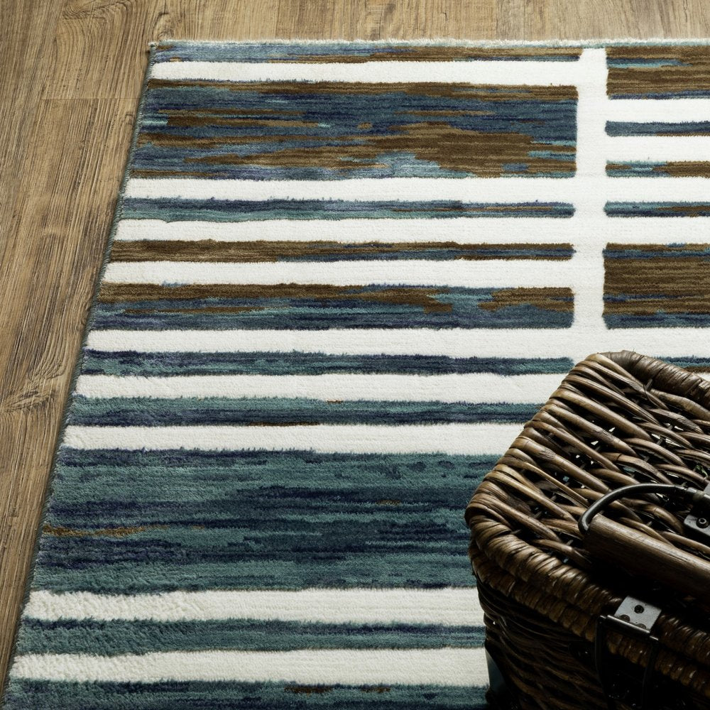 8' X 11' Ivory And Blue Geometric Area Rug