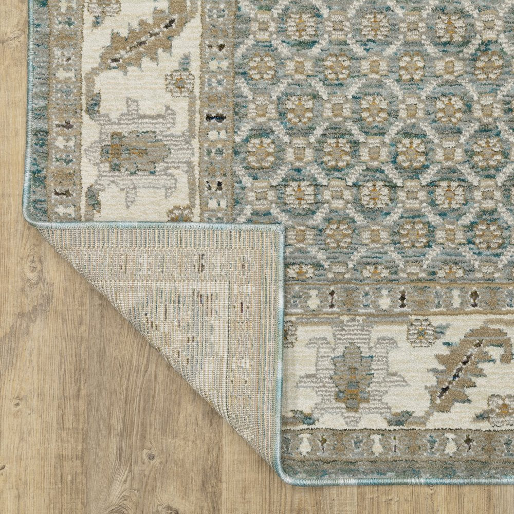 9' X 12' Blue And Ivory Oriental Area Rug
