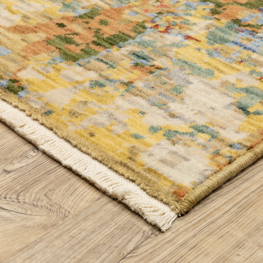 8' X 11' Beige Salmon And Tan Abstract Area Rug With Fringe