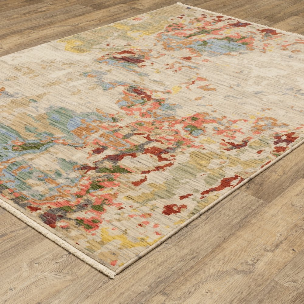 8' X 11' Beige Salmon And Tan Abstract Area Rug With Fringe