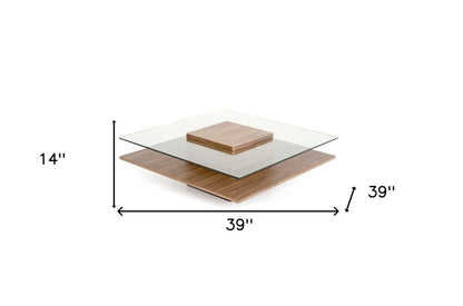 39" Clear and Brown Glass and Wood Pedestal Coffee Table With Shelf