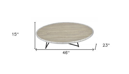 46" Natural and Black Wood And Iron Round Abstract Coffee Table