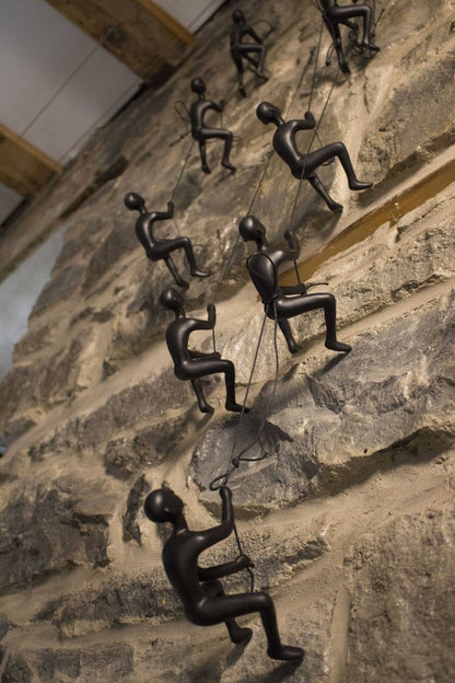 Set of Four Black Resin Climbing Man Hanging Dimensional Sculpture