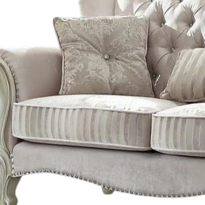 70" Bone And Gold Faux Leather Curved Loveseat