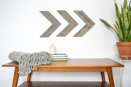 Set of Three Gray Distressed Wood Hanging Arrow Dimensional Sculptures