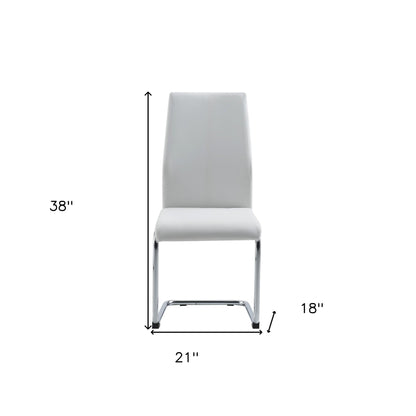 Set of Four White and Silver Upholstered Faux Leather Dining Side Chairs