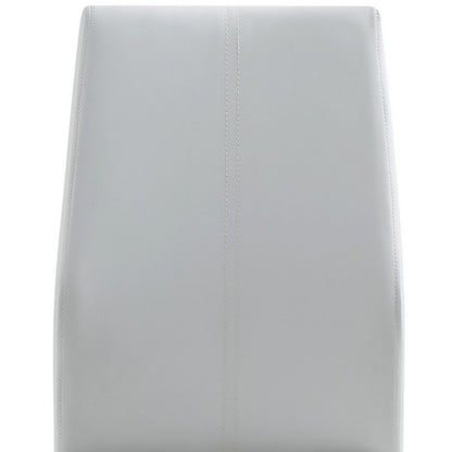 Set of Four White and Silver Upholstered Faux Leather Dining Side Chairs