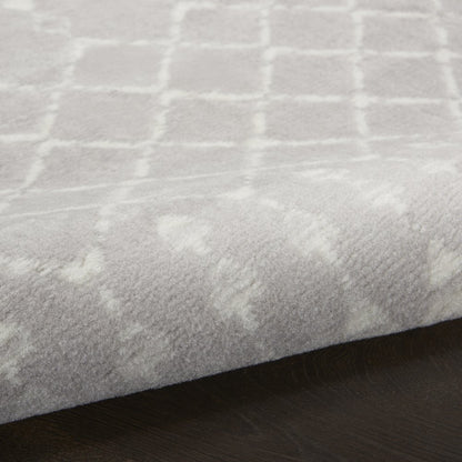 5' X 7' Gray And Ivory Geometric Area Rug