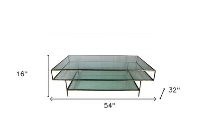 54" Clear and Brass Glass and Iron Coffee Table