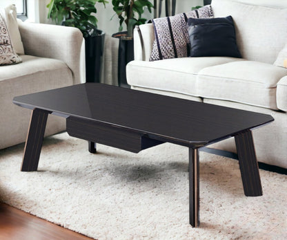 55" Ebony and Dark Brown Wood And Stainless Steel Coffee Table With Drawer