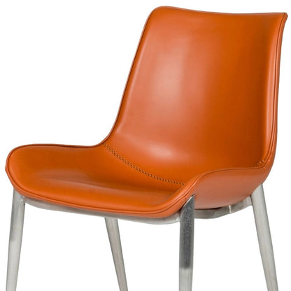 Set of Two Terra Cotta and Silver Upholstered Faux Leather Wing Back Dining Side Chairs