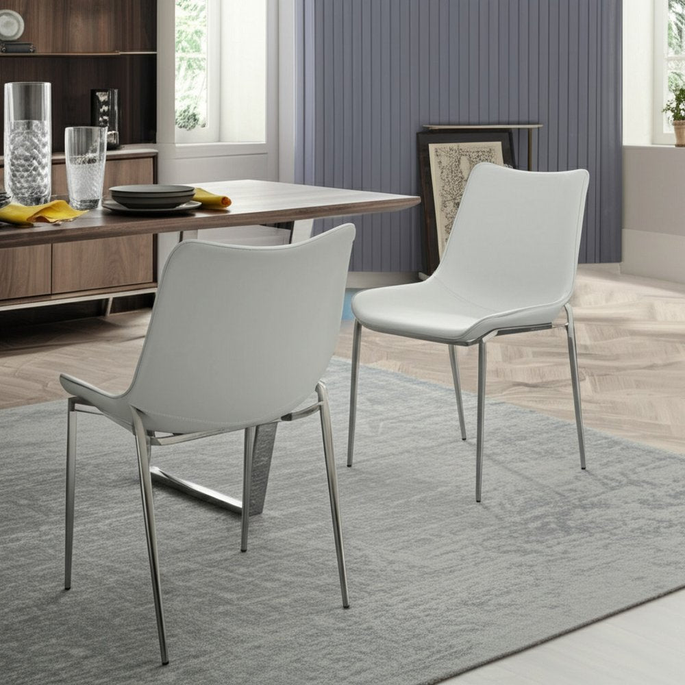 Set of Two White and Silver Upholstered Faux Leather Dining Side Chairs