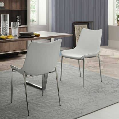 Set of Two White and Silver Upholstered Faux Leather Dining Side Chairs