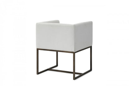 Off White and Antiqued Brass Upholstered Fabric Dining Arm Chair