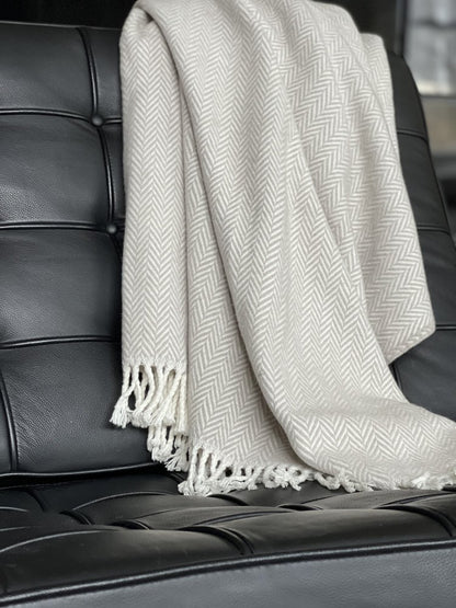 70" X 55" Gray And White Herringbone Cotton Blend Woven Throw Blanket with Tassels