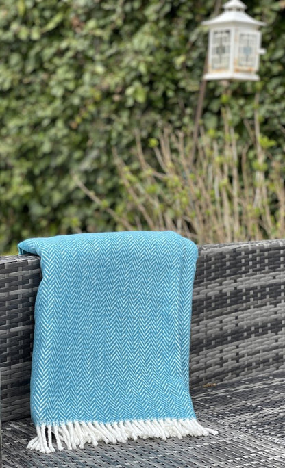 70" X 55" Teal Blue And White Cotton Blend Woven Herringbone Plush Throw Blanket with Tassels