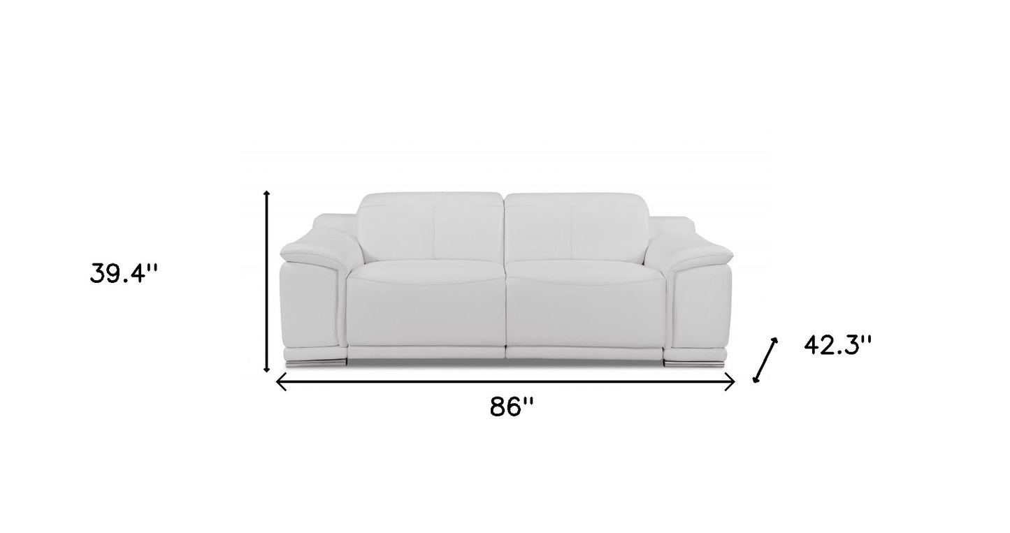86" White Italian Leather USB Reclining Sofa With Silver Legs