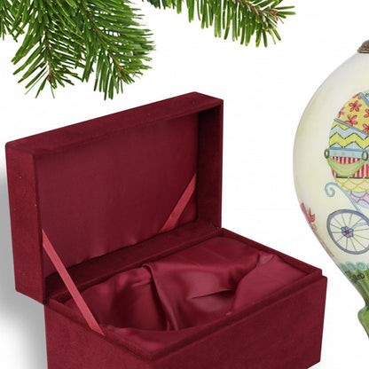 Baby Carriage with Presents Hand Painted And Mouth Blown Ivory Red And Yellow Glass Finial Ornament