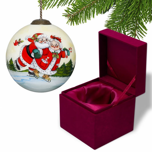 Ice Skating Mr. and Mrs. Santa Hand Painted And Mouth Blown Red White And Green Glass Ball Ornament