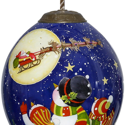 Snowmen Family Watching Santa on a Sleigh Hand Painted And Mouth Blown Blue And White Glass Finial Ornament