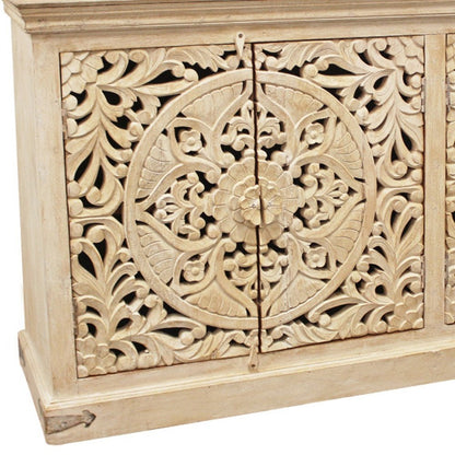 71" Beige Distressed Solid Wood Carved Scrollwork Sideboard with Four Doors
