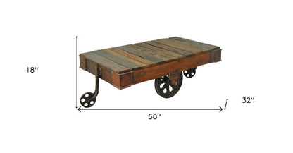 50" Brown and Black Solid Wood and Iron Distressed Wheel Coffee Table