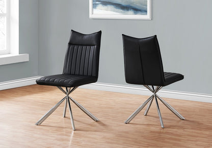 Set of Two Tufted Black And Silver Upholstered Faux Leather Dining Parsons Chairs