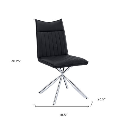 Set of Two Tufted Black And Silver Upholstered Faux Leather Dining Parsons Chairs