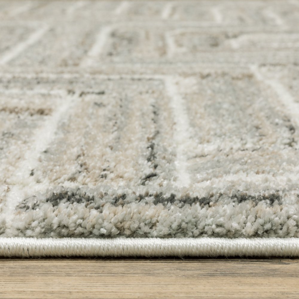 8' X 11' Ivory And Beige Geometric Area Rug