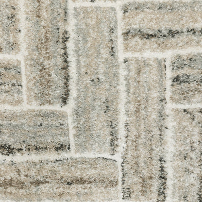 8' X 11' Ivory And Beige Geometric Area Rug